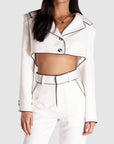 white blazer with contrast piping